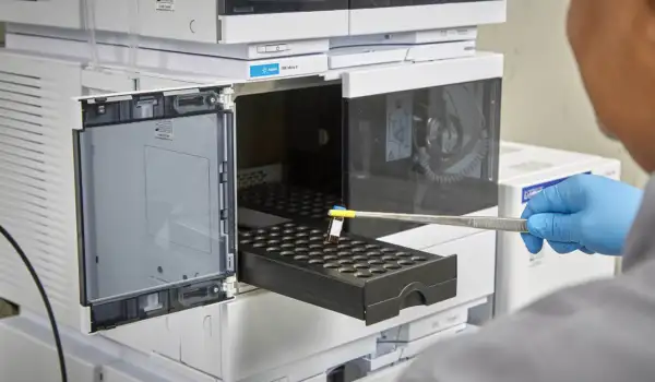 Dr Bassim Abdulwahaab operating HPLC instrumentation to check the quality of the product manufactured in the facility